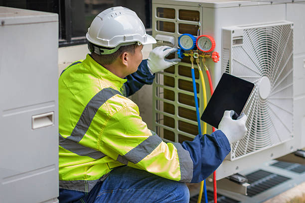Professional Air Conditioning Repair technician working in Marengo, IA